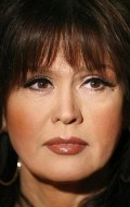 Full Marie Osmond filmography who acted in the animated movie Rose Petal Place.